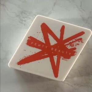 Fenty Beauty Compact with Bold Red Design